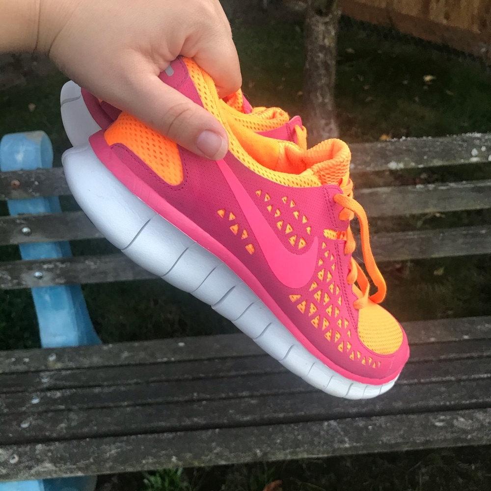 Pink and Orange Nike Free Runs